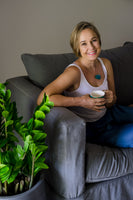 Natasha sitting in her Yoga studio in Barbados